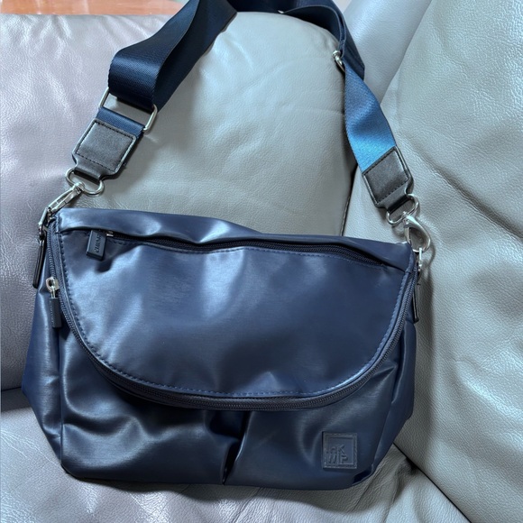 Ihkwip Handbags - IHKWIP Sidekick Folder over crossbody bag